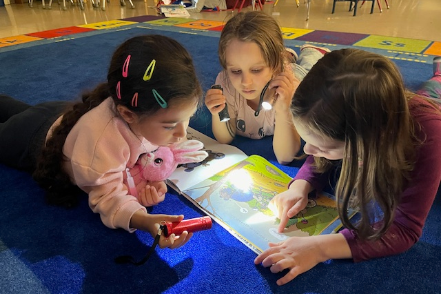 kids reading a book