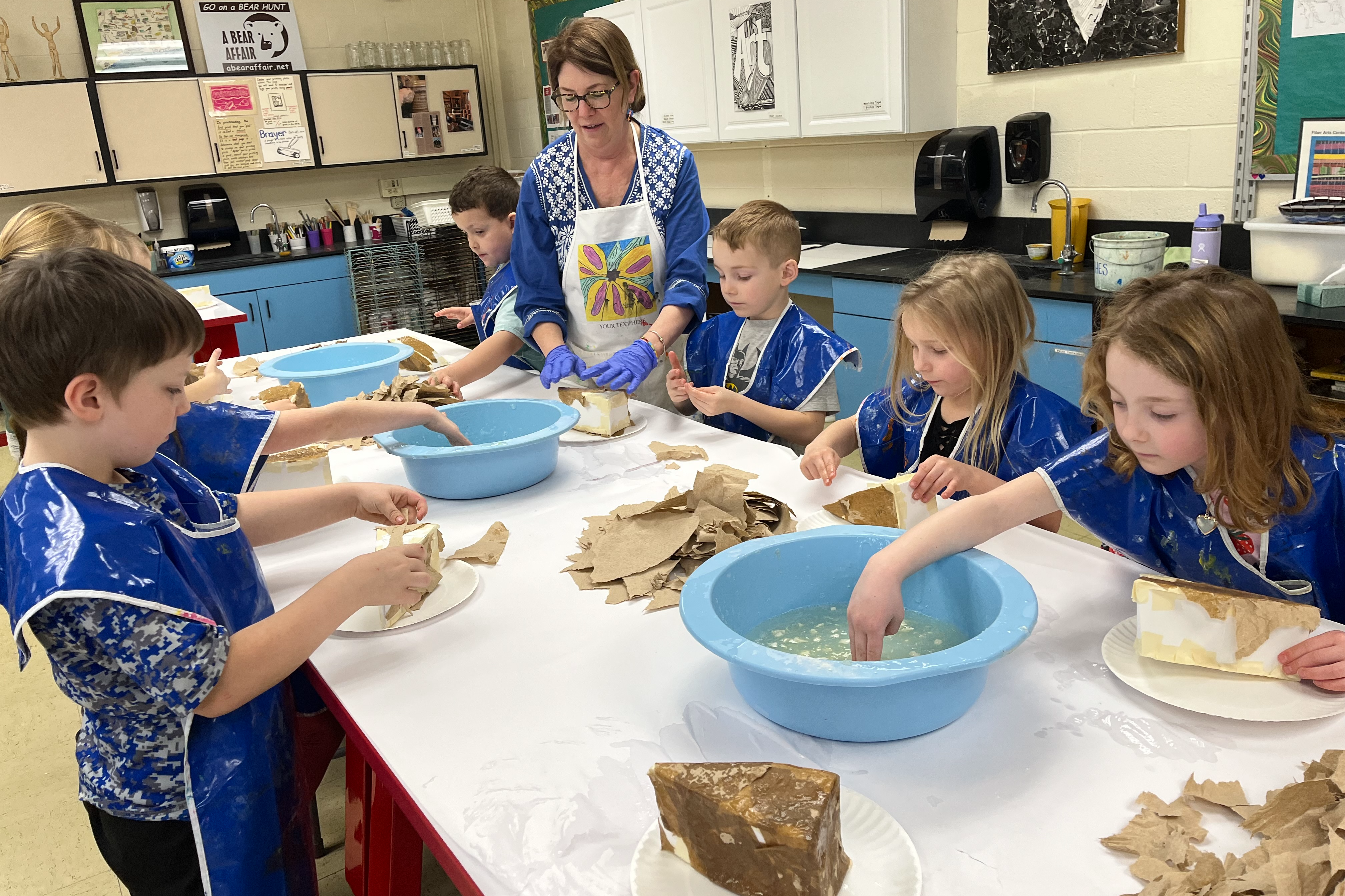 kids doing papier mache