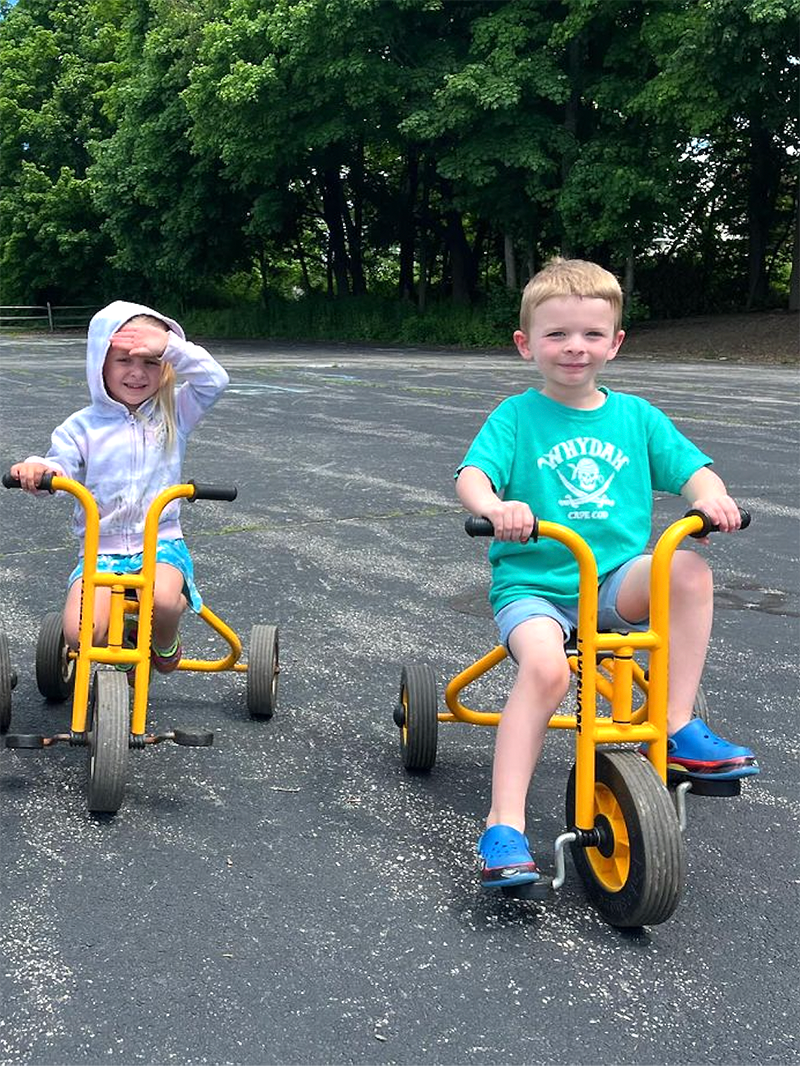 kids on tricycles