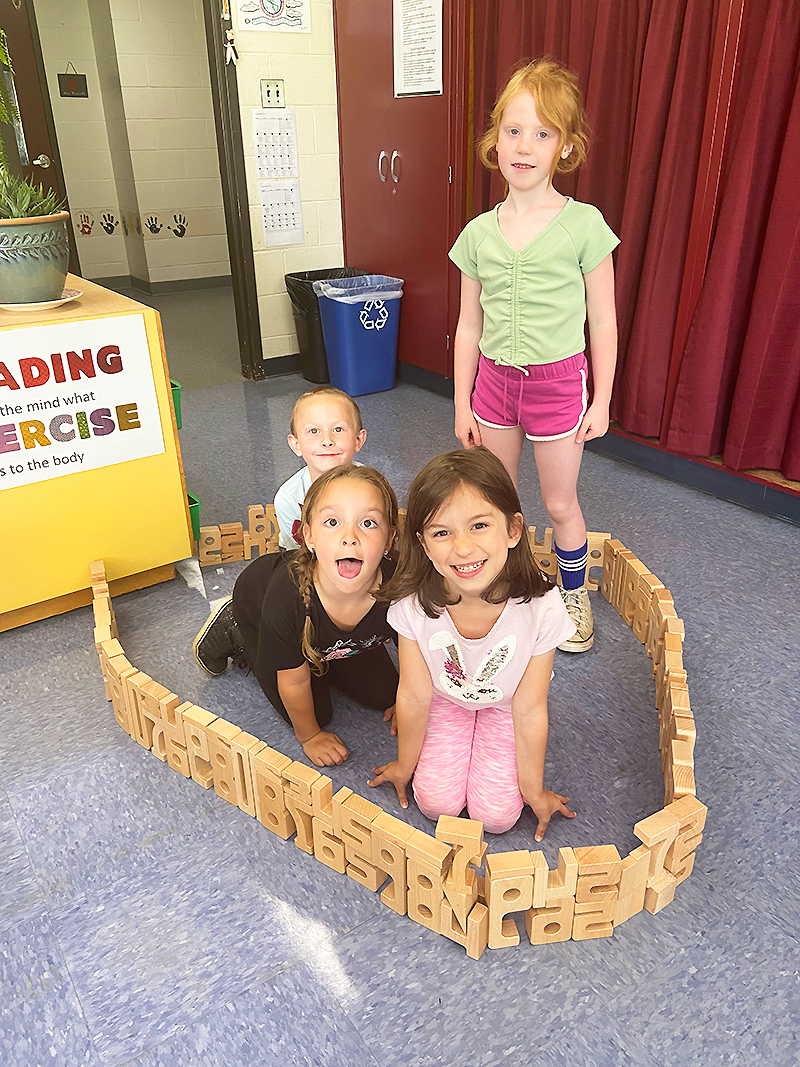 kids building with blocks