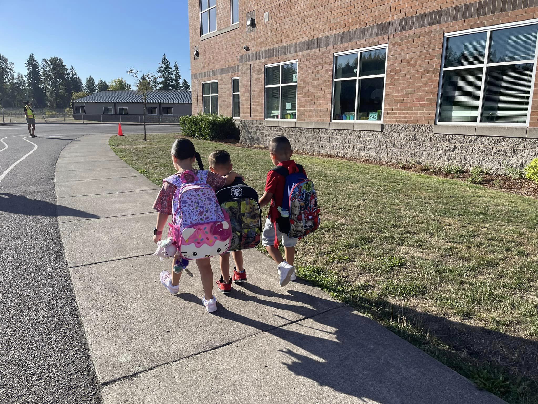 Students walk into school together