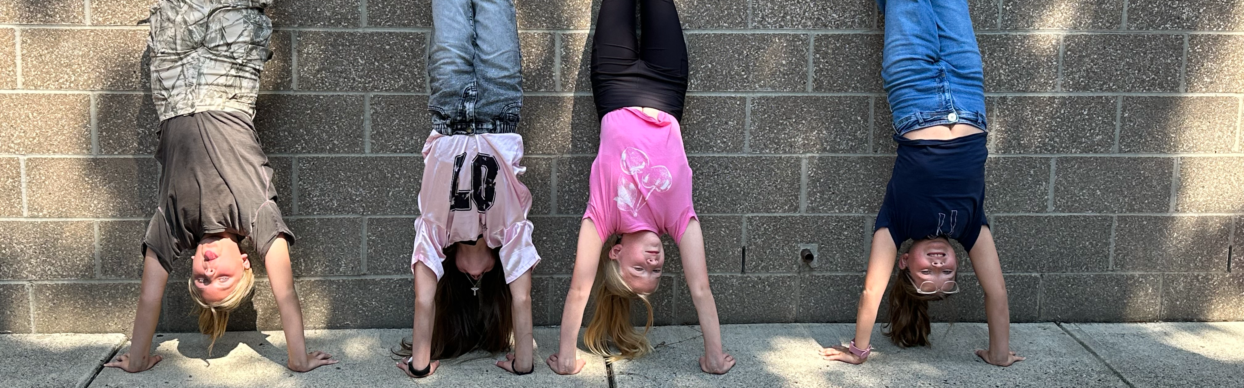 girls doing handstands