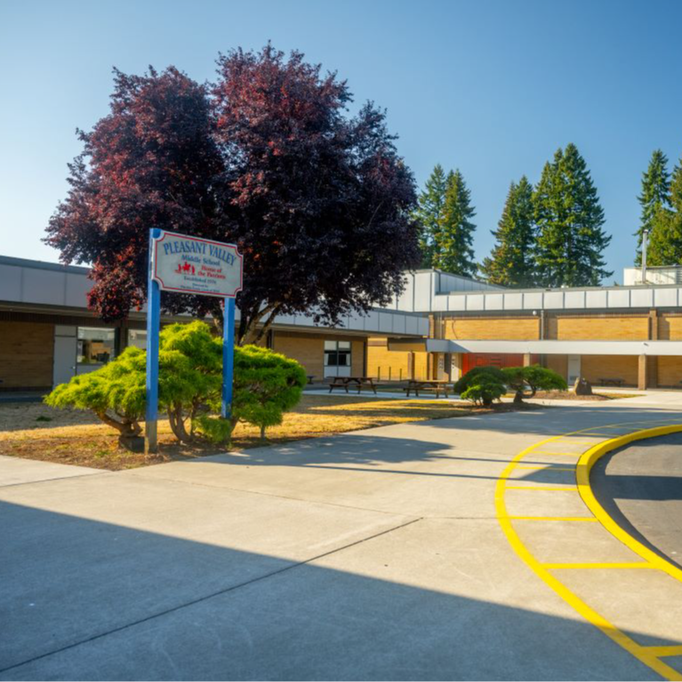 Exterior of Pleasant Valley Middle School with the sign in the foreground