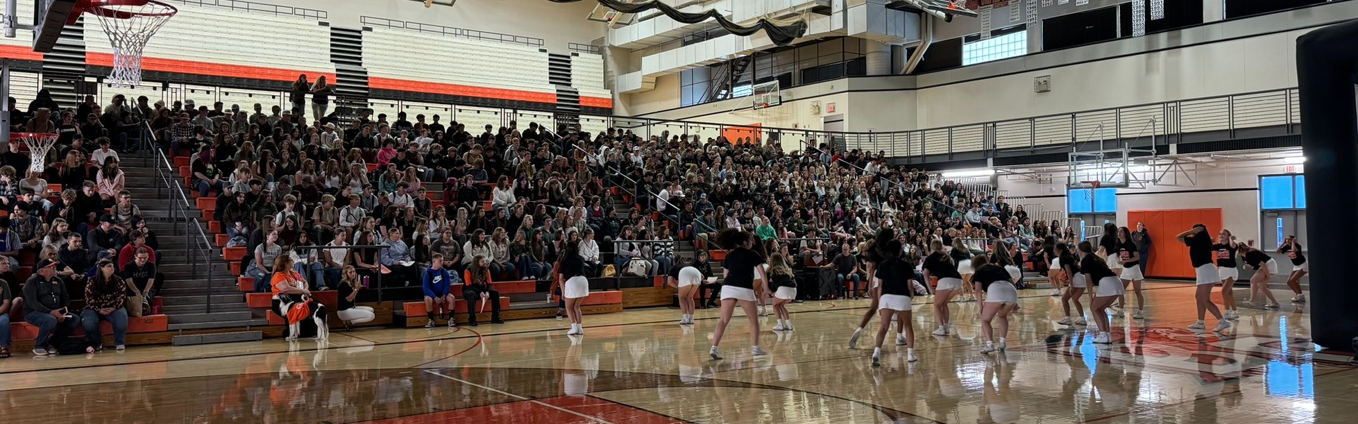cheerleaders welcome all freshmen students