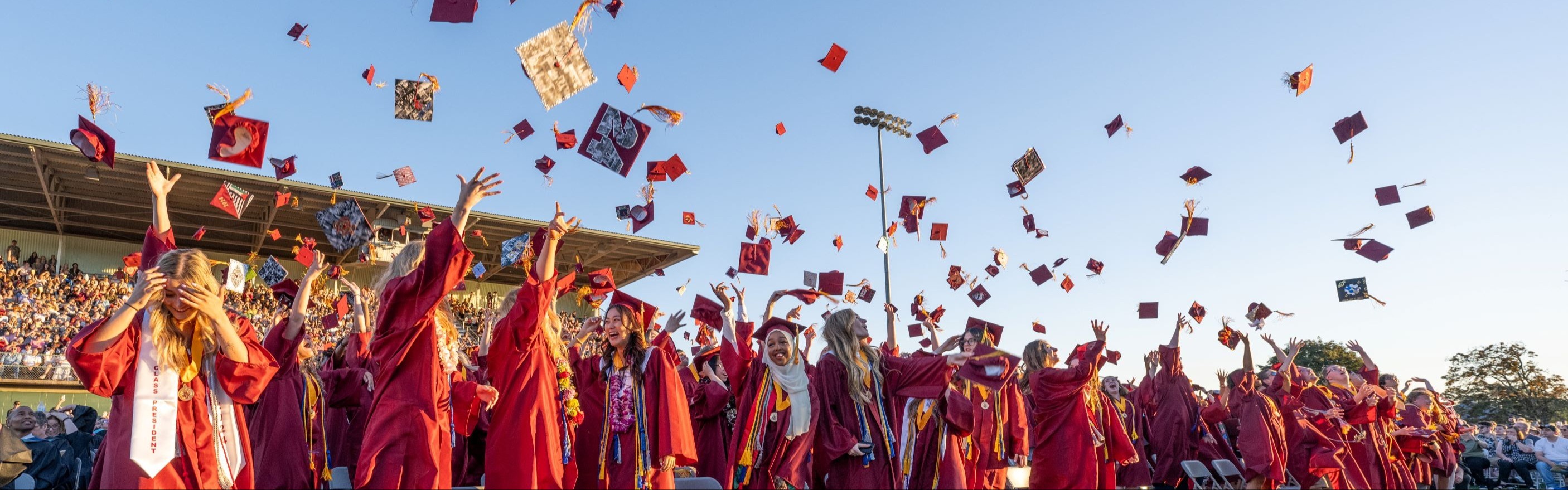 Prairie High School's class of 2024 tosses up its caps at the graduation ceremony.