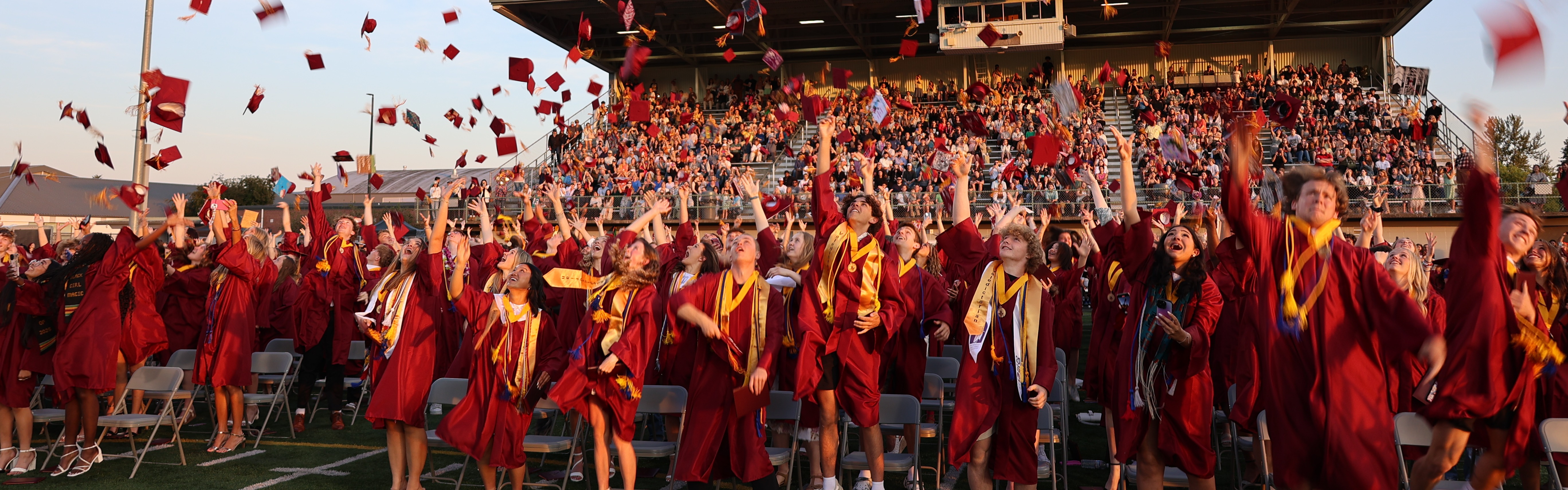 Prairie High School's class of 2025 tosses up its caps at the graduation ceremony.