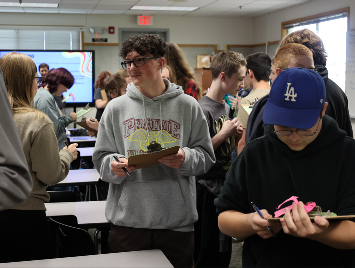 Students participate in a teambuilding exercise