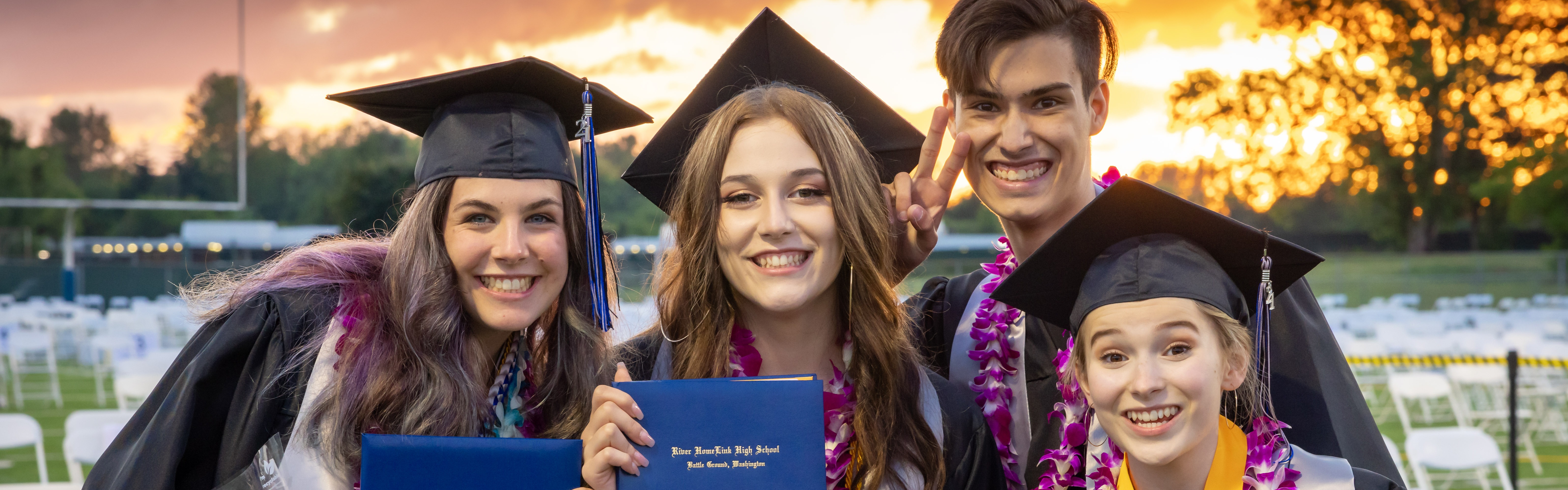 group of smiling grads