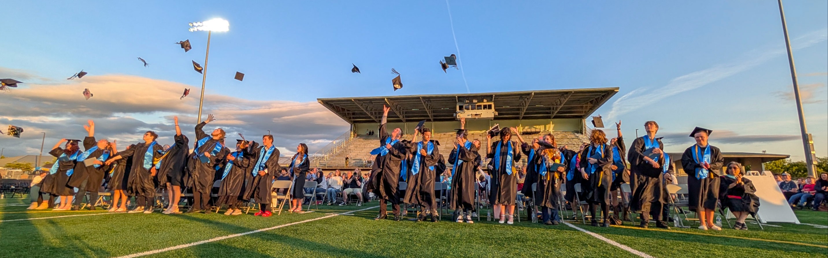 group of smiling grads