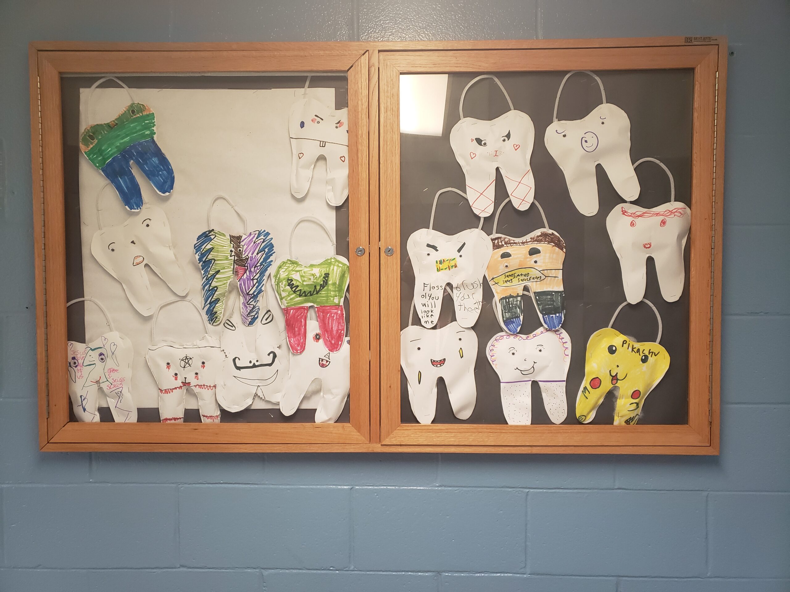 A picture of teeth hanging on a wall
