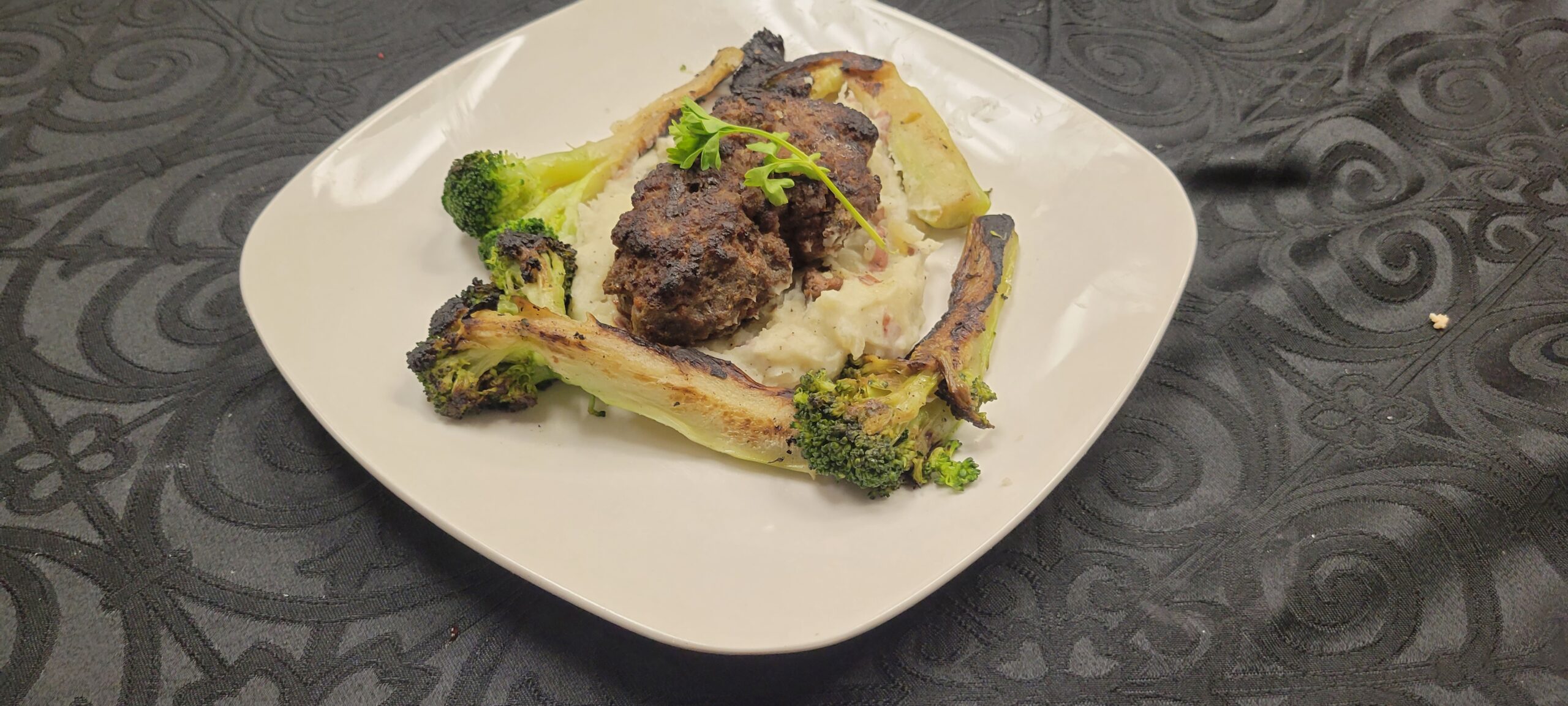 Delicious plate of food with broccoli and meat