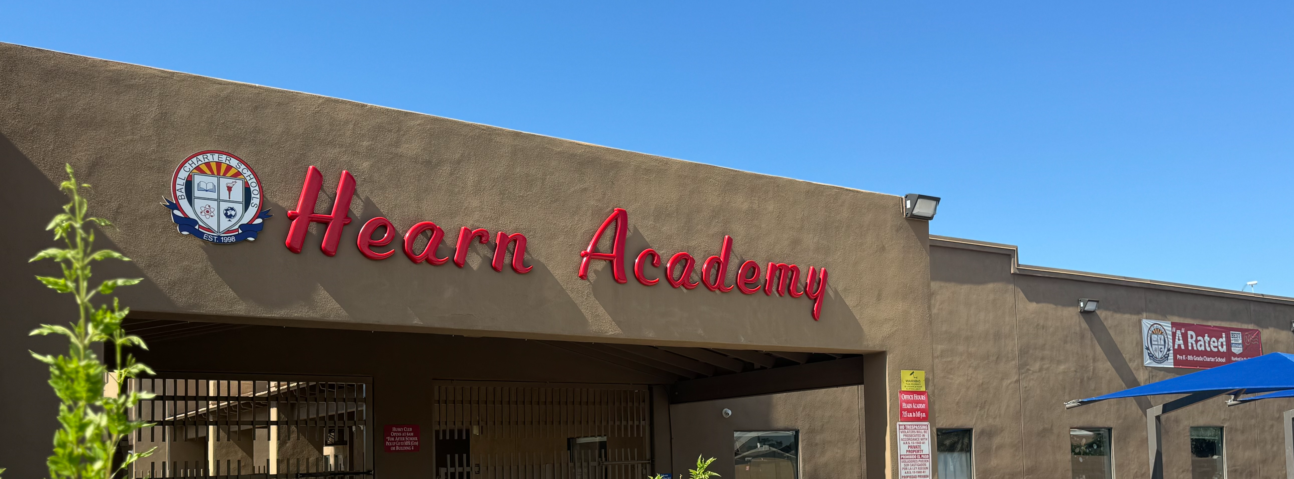 Hearn Academy Front of Building with school crest 