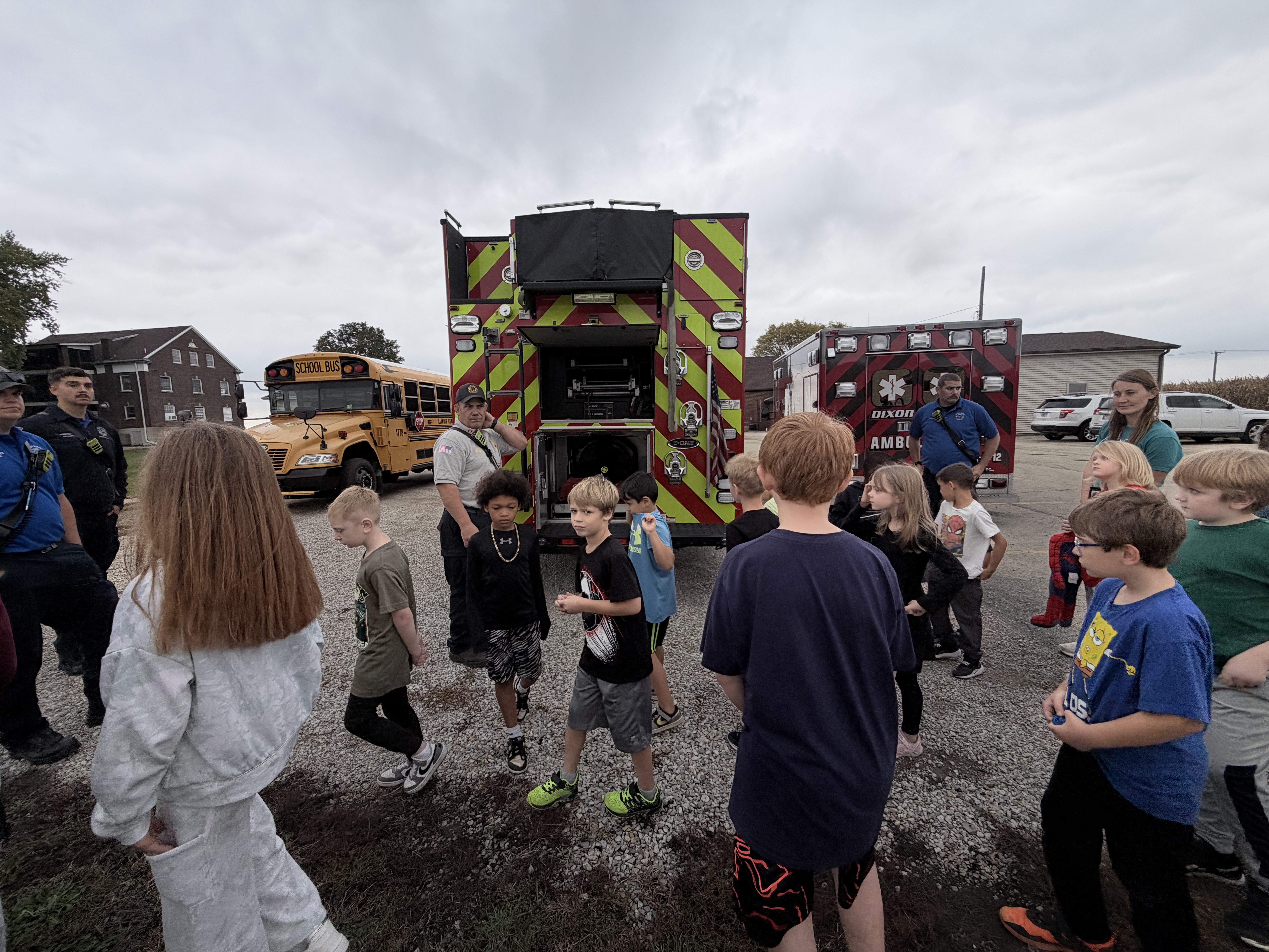 TJD students interacting with Fire Department and trucks