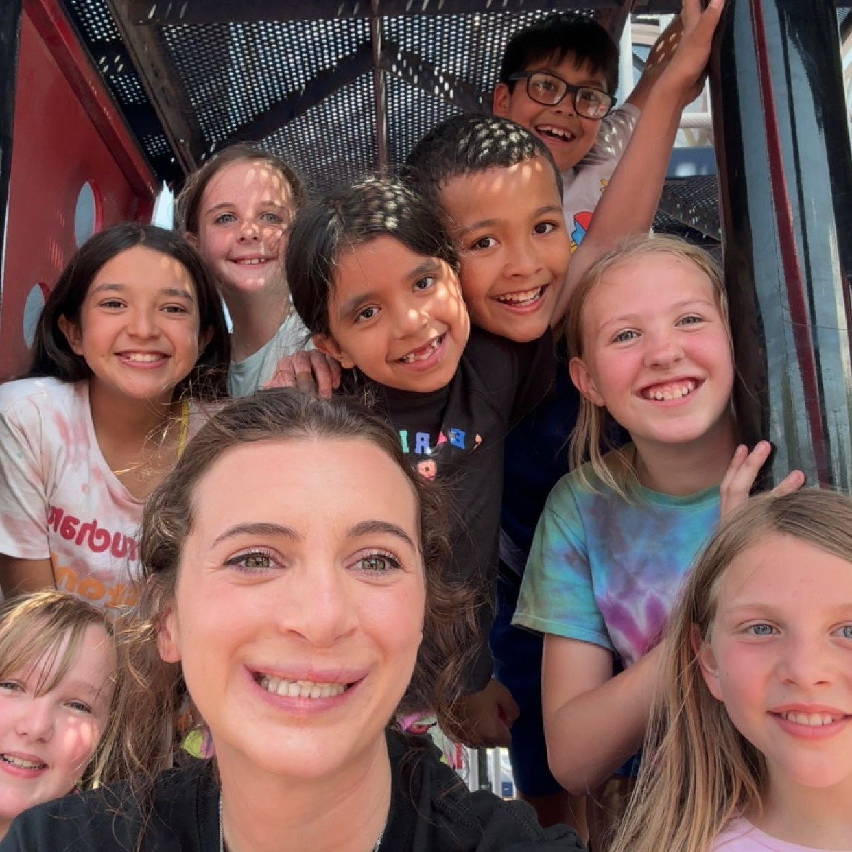 Teacher and her students at the park.