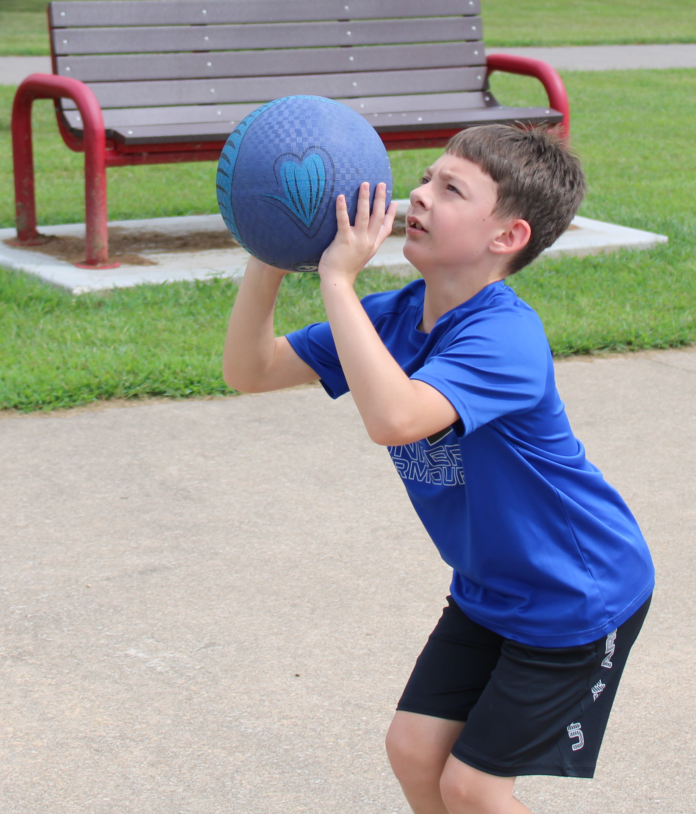 Student playing basketball