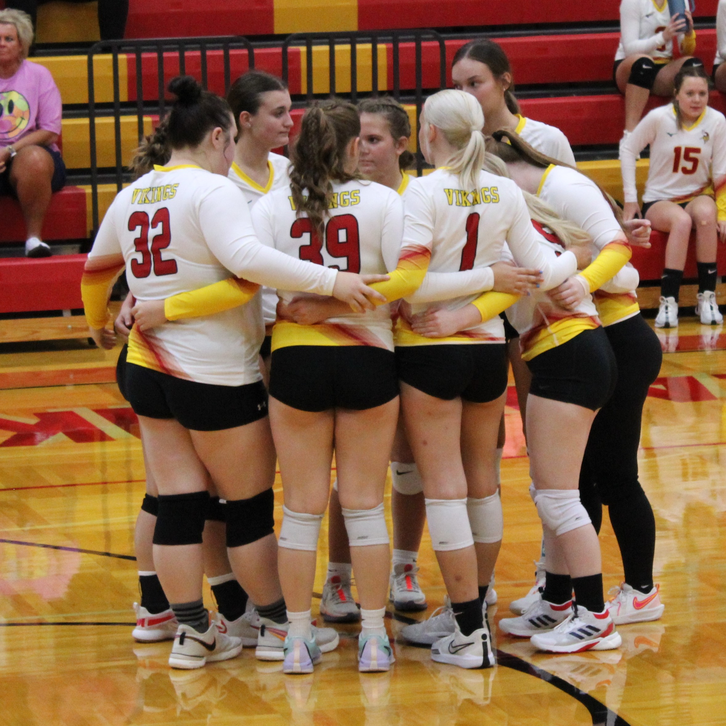 Volleyball Players Huddle