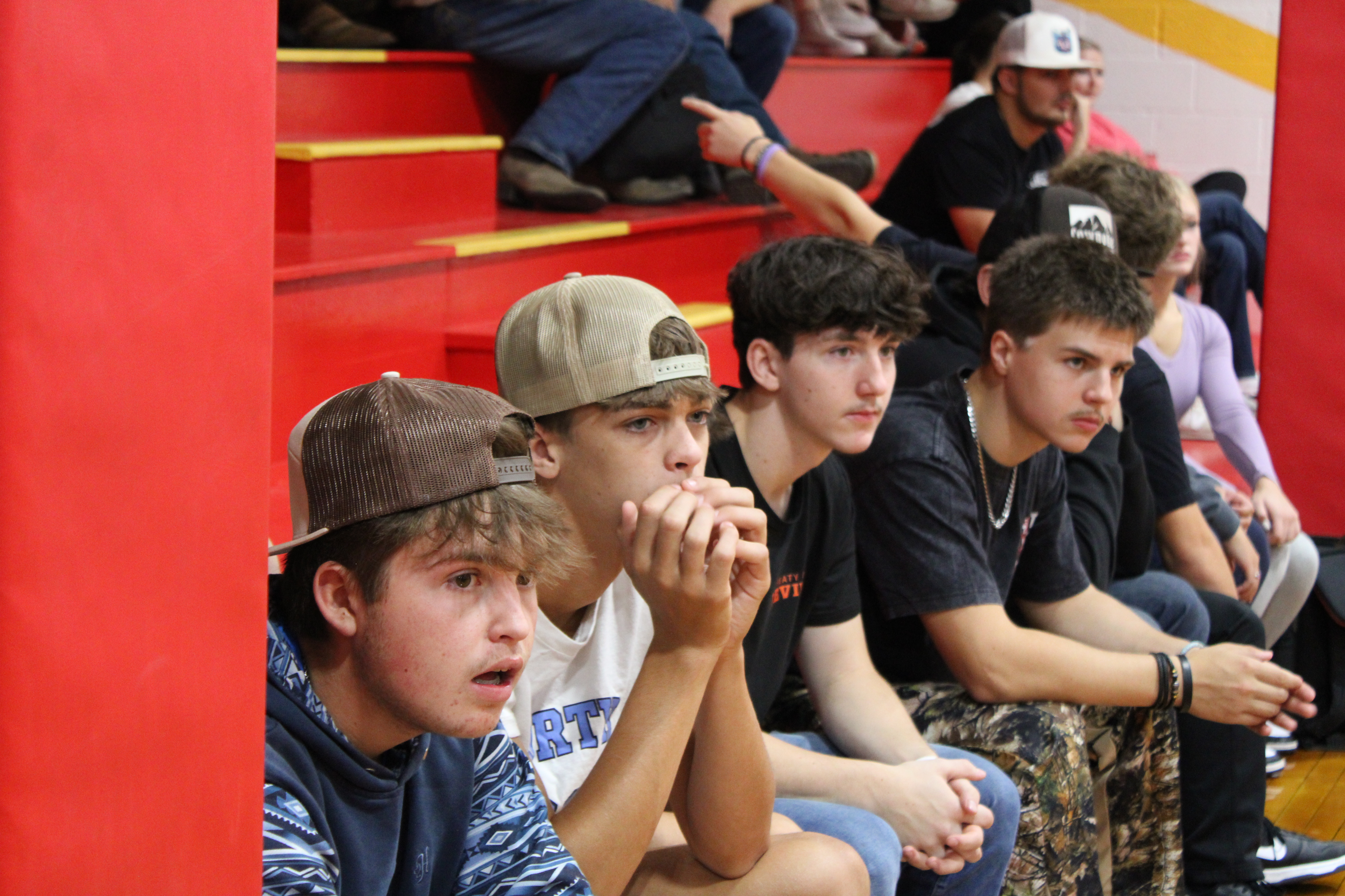 Students Sitting on Bleachers