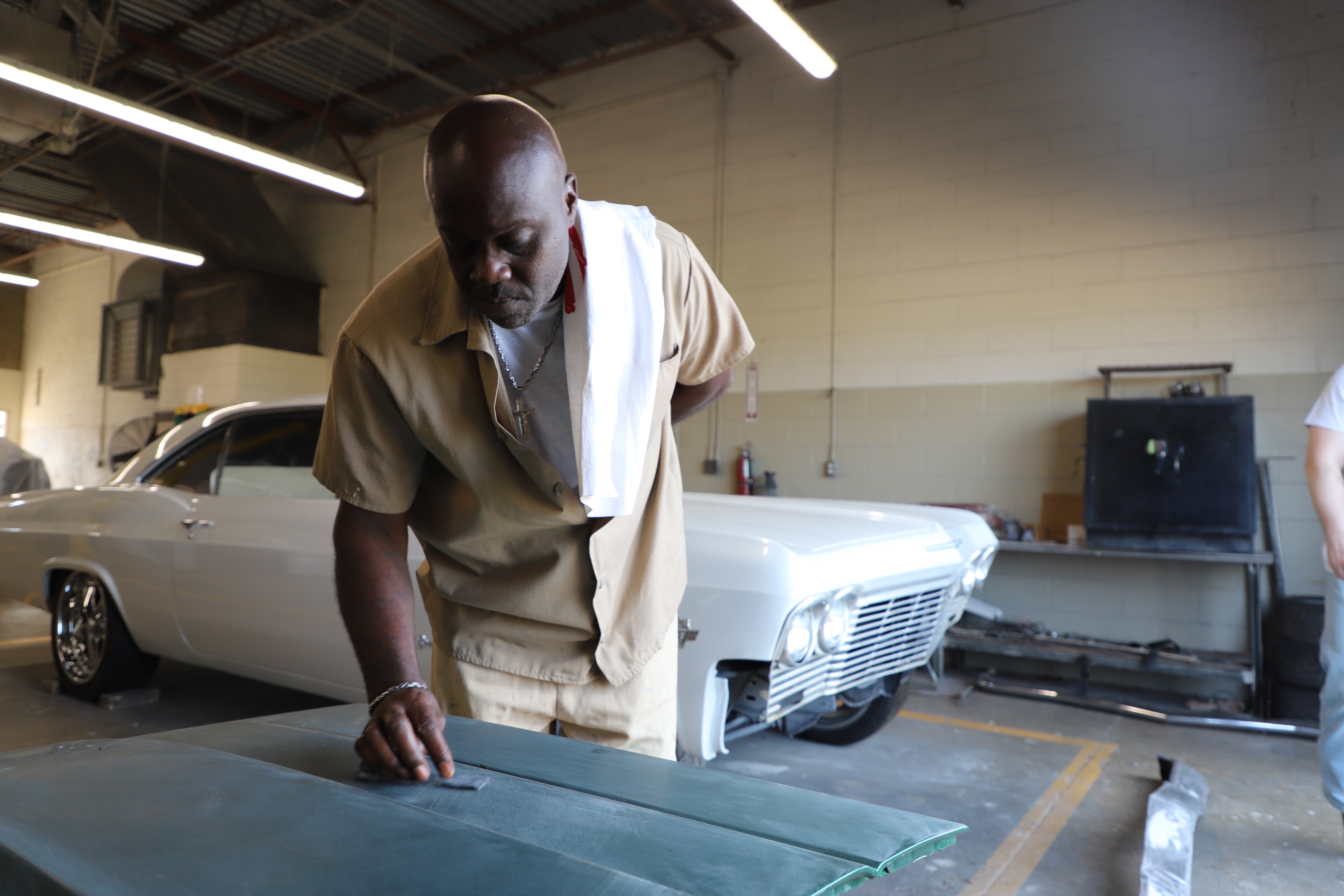 Automotive body repairers restore and refinish vehicle bodies and frames