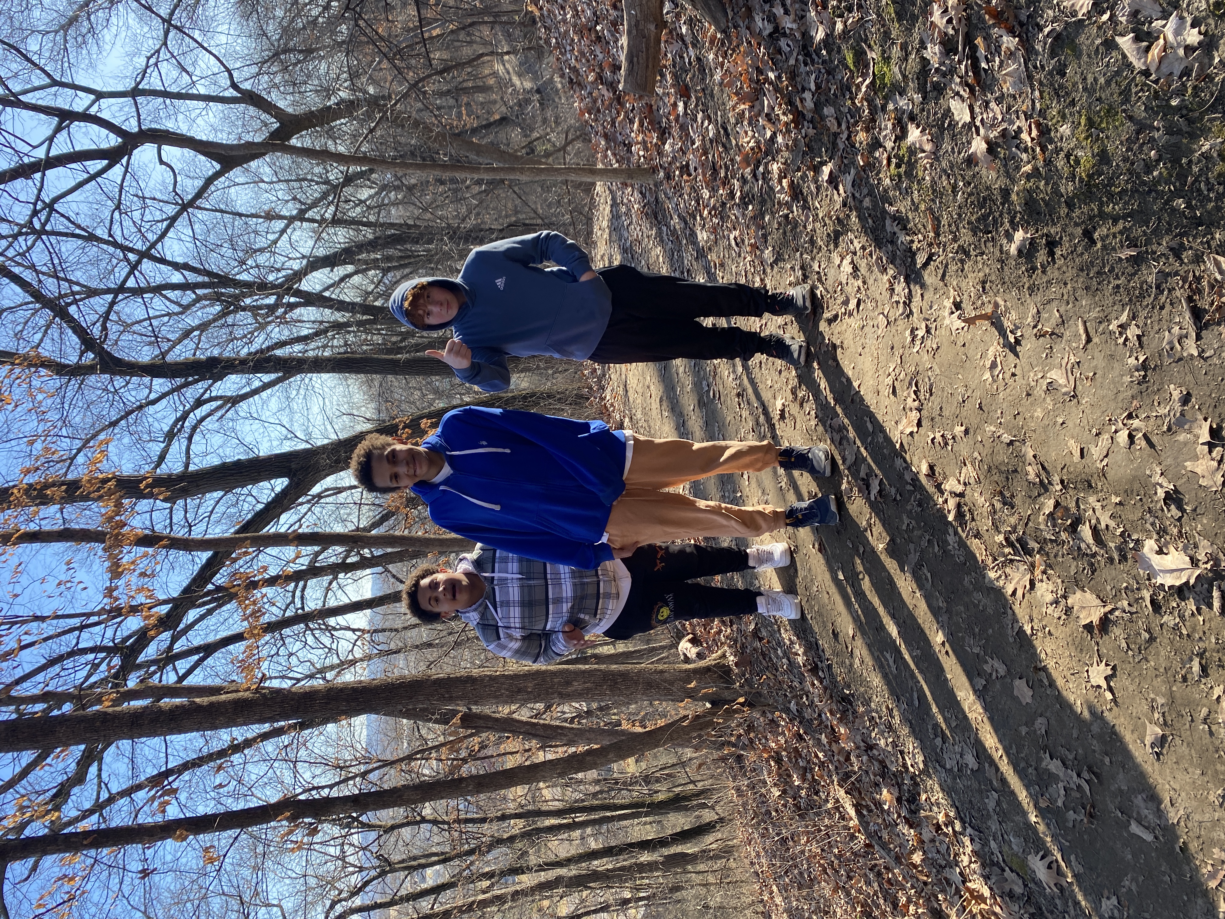 Three students hiking