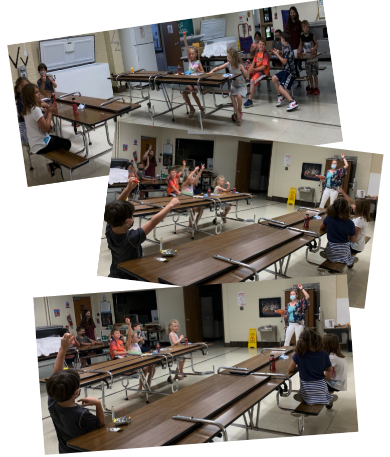photo collage of students raising their hands during the discussion of the book "A Little Spot of Confidence"