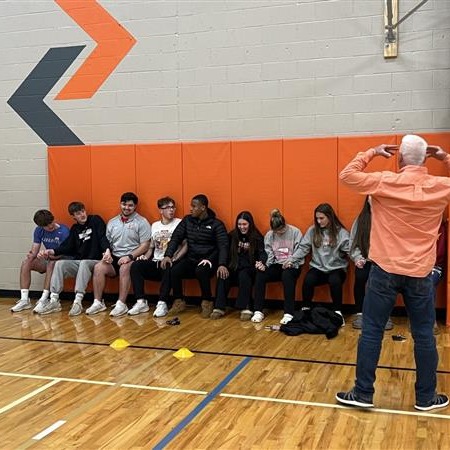 A man giving a presentation to a group of people.