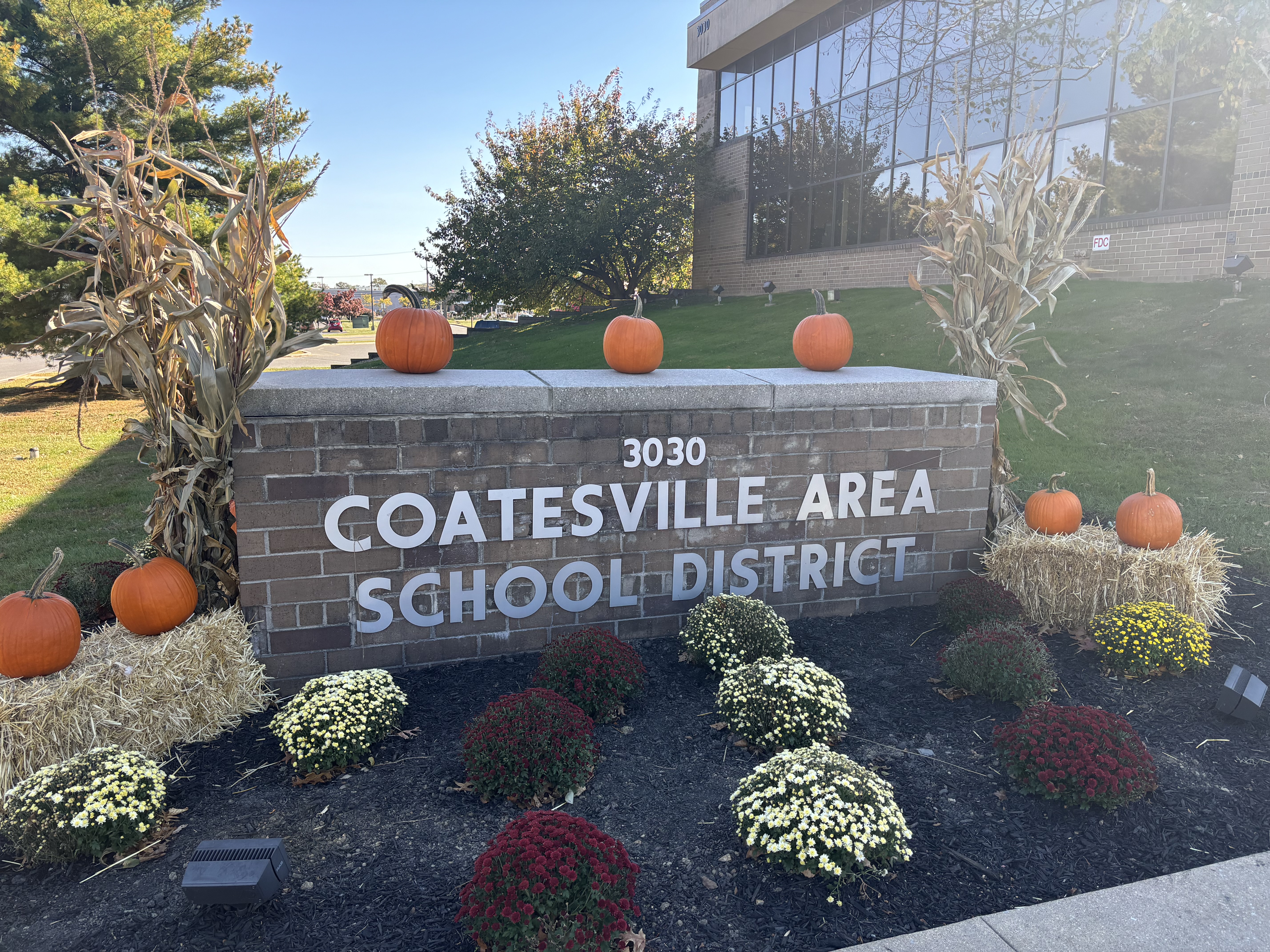 district signage with fall decor