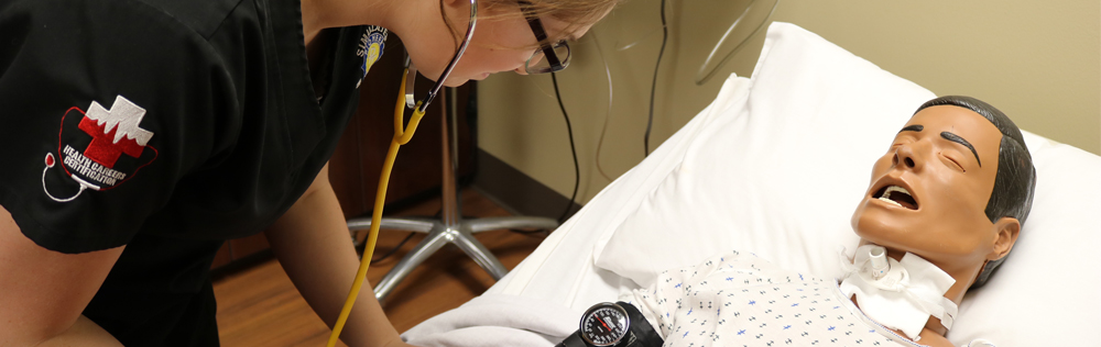 photo of student checking on a patient