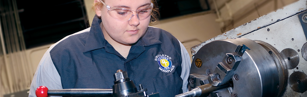 photo of Precision Machining student working on a lathe