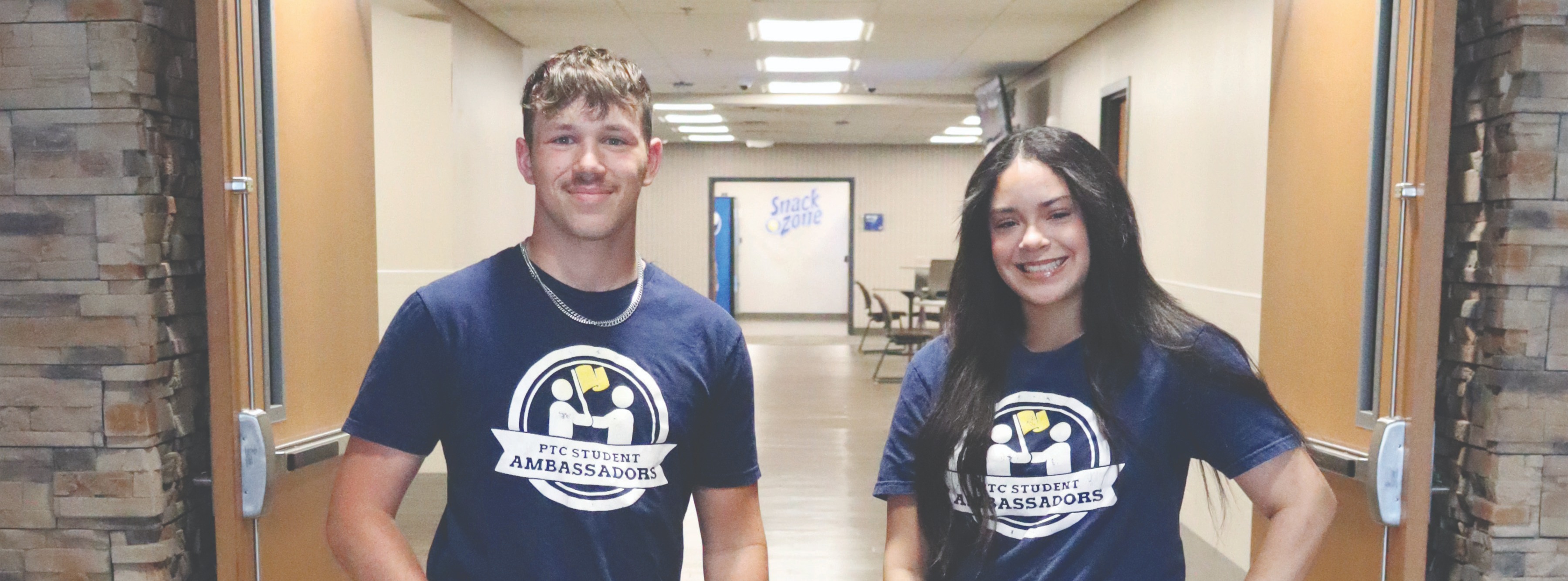 student ambassadors standing in hallway