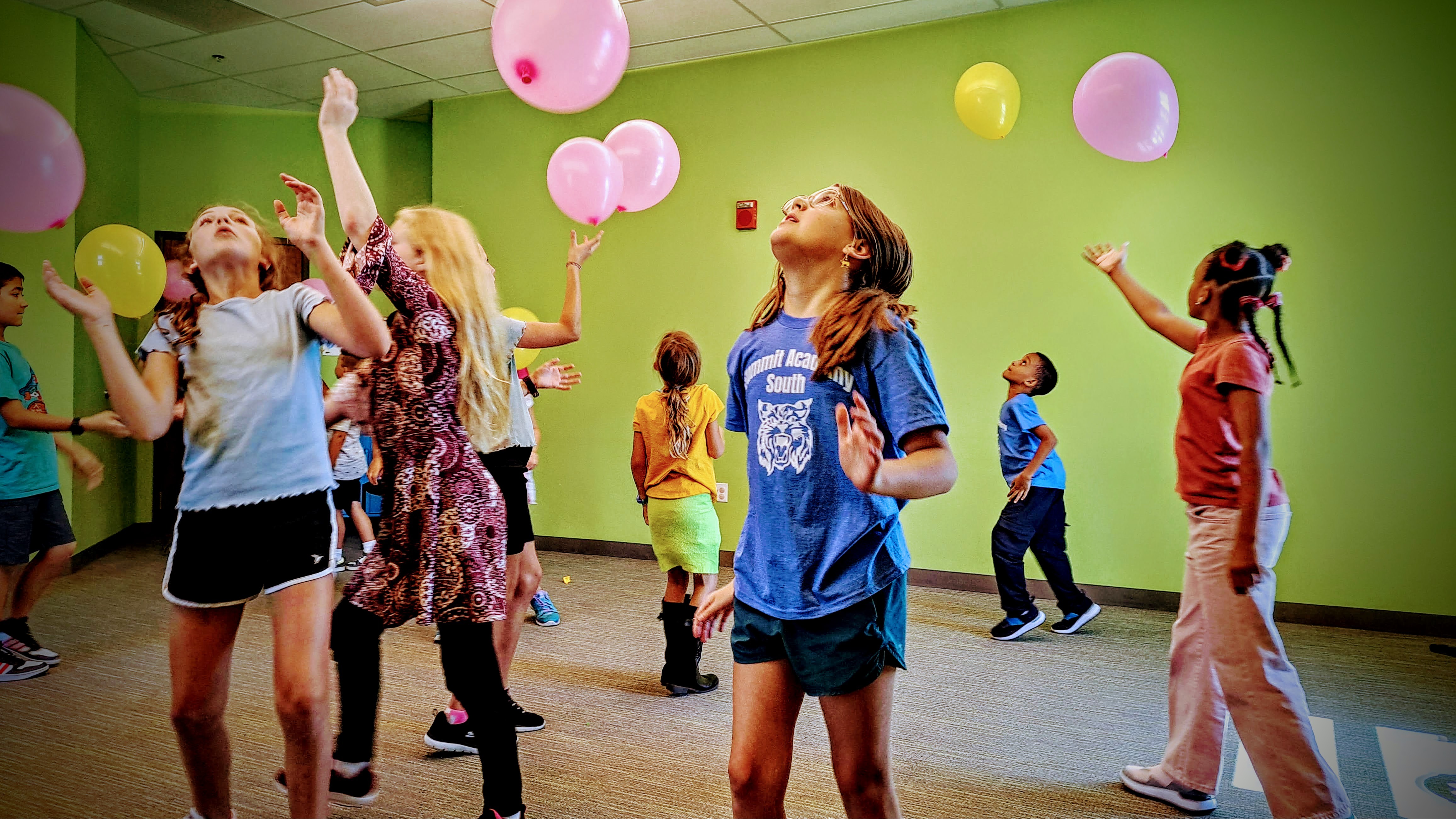 Students playing a balloon game