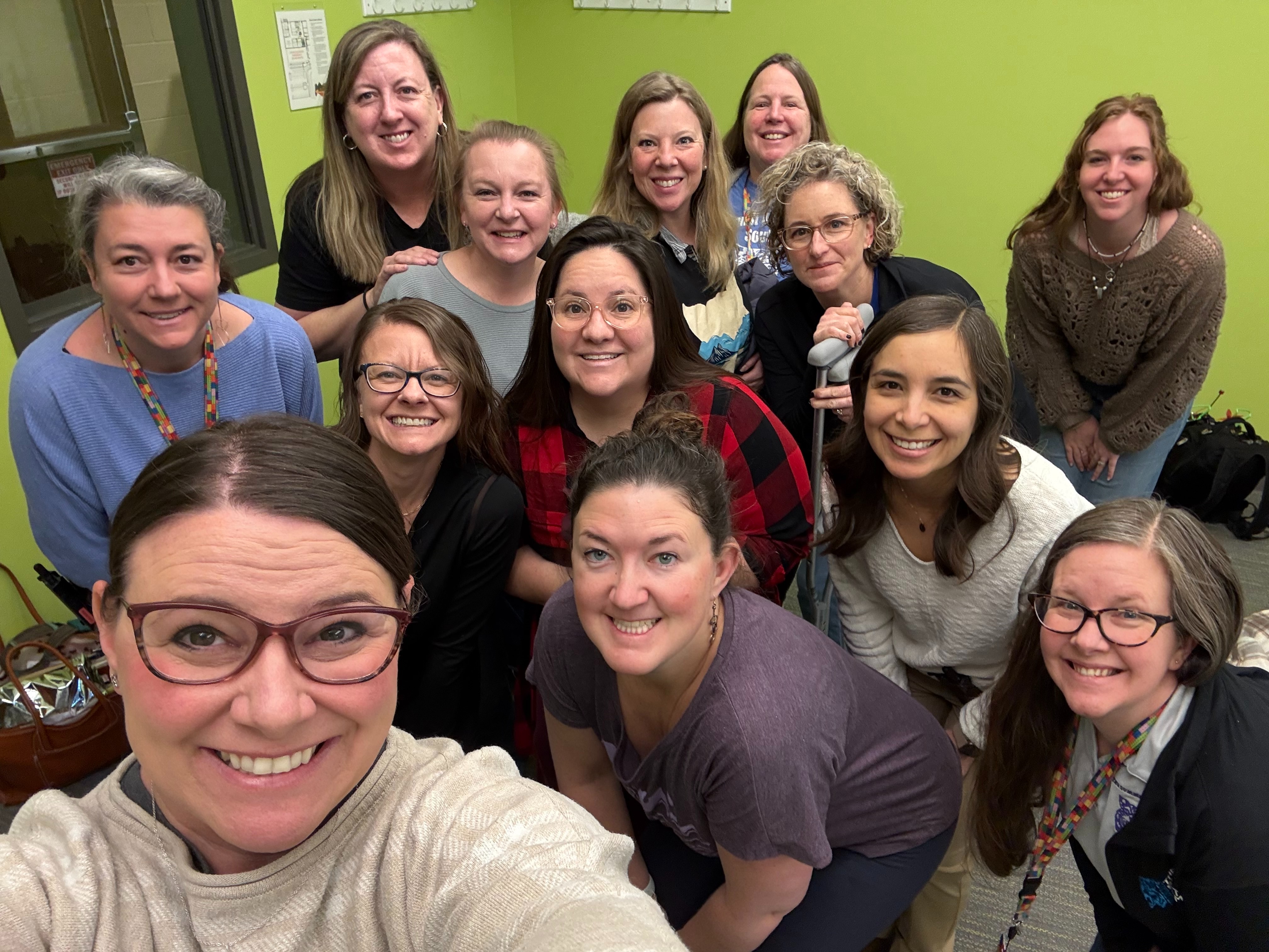 Some staff taking a selfie as a group