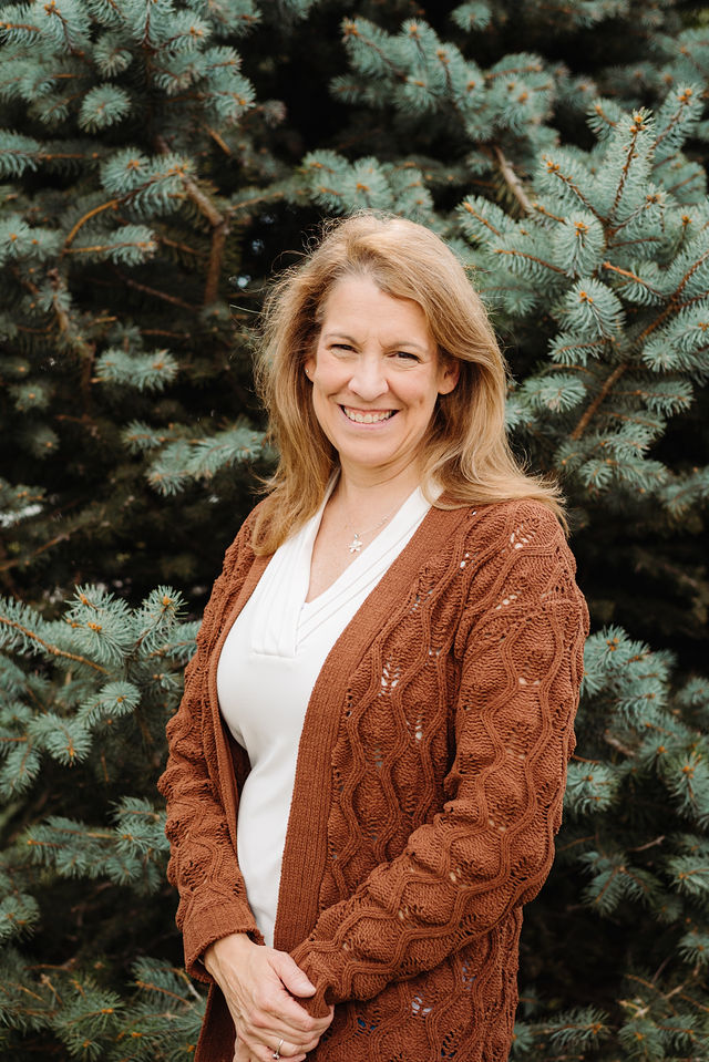Photo of Jill Ellingson in front of tree