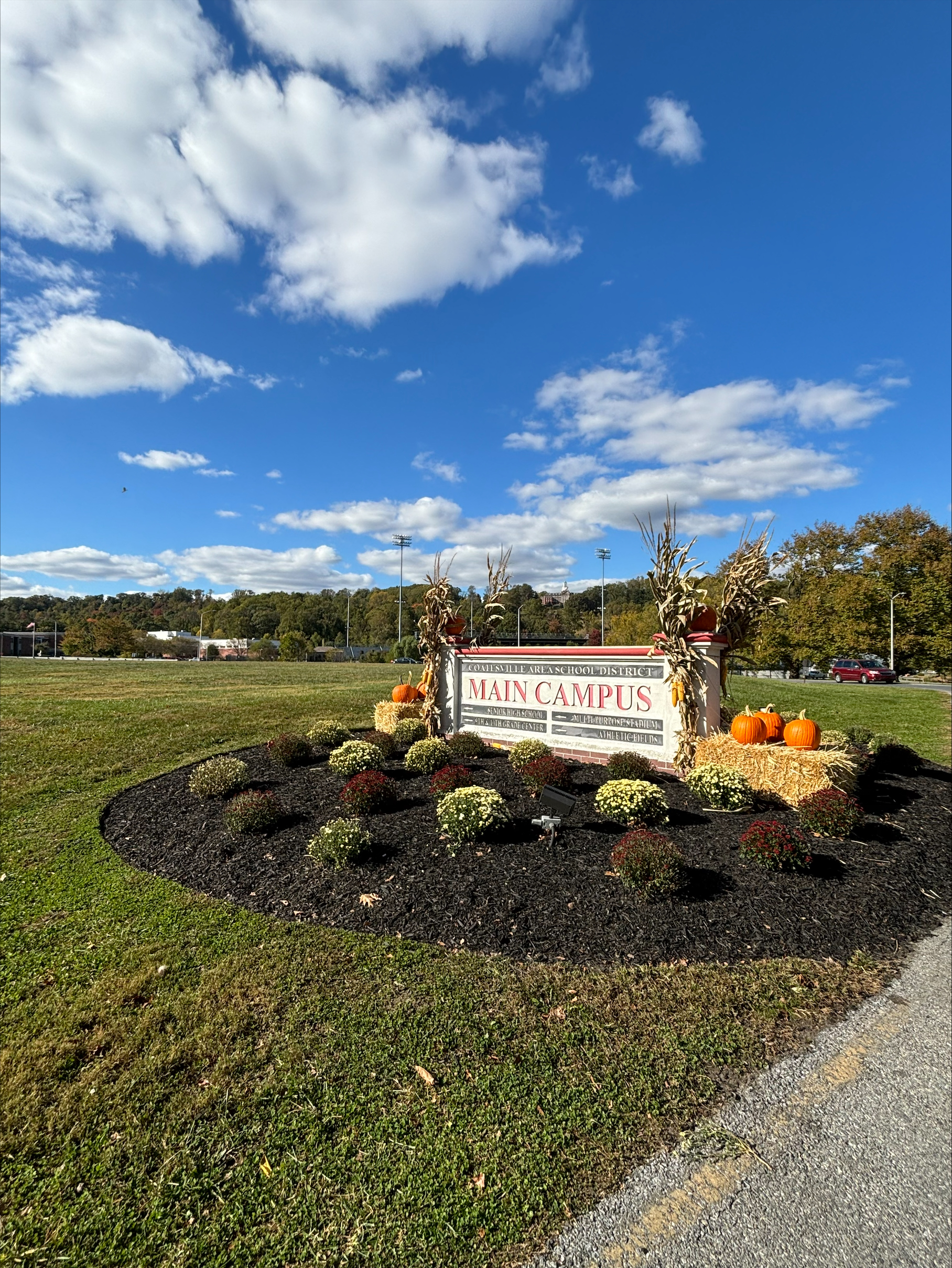 fall decorated entrance to main campus