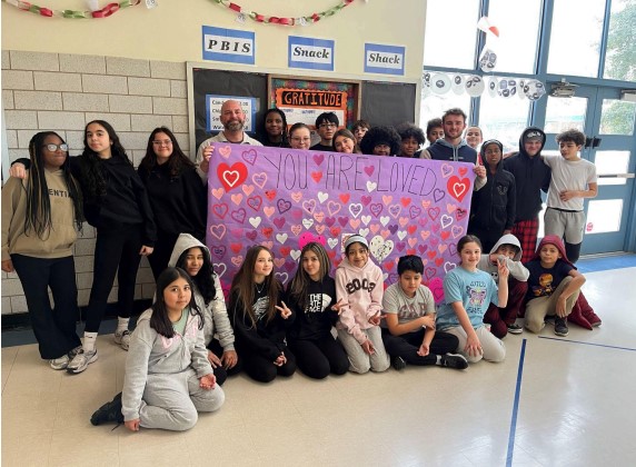 students created valentine banner for free village