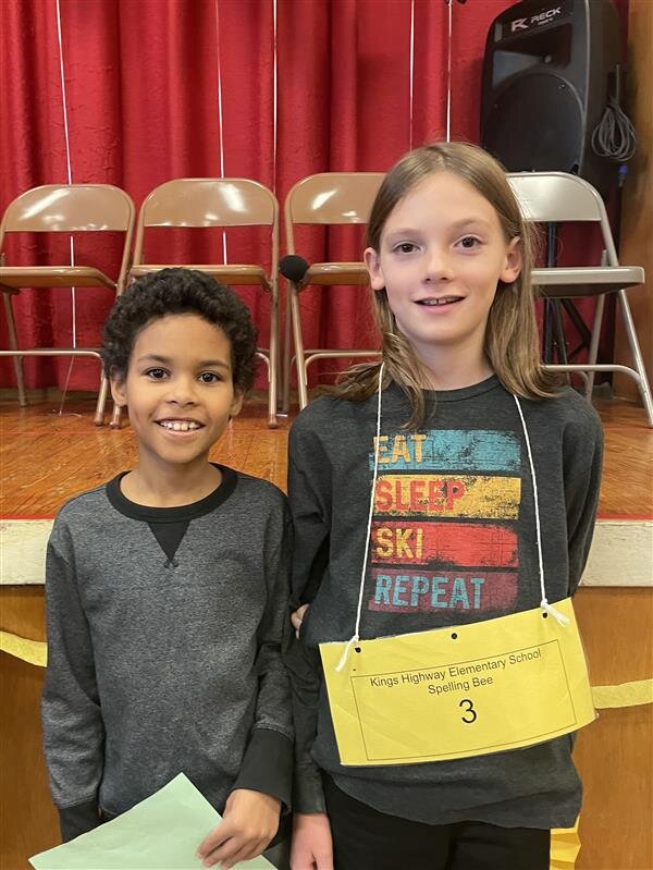 Two children posing for a photo