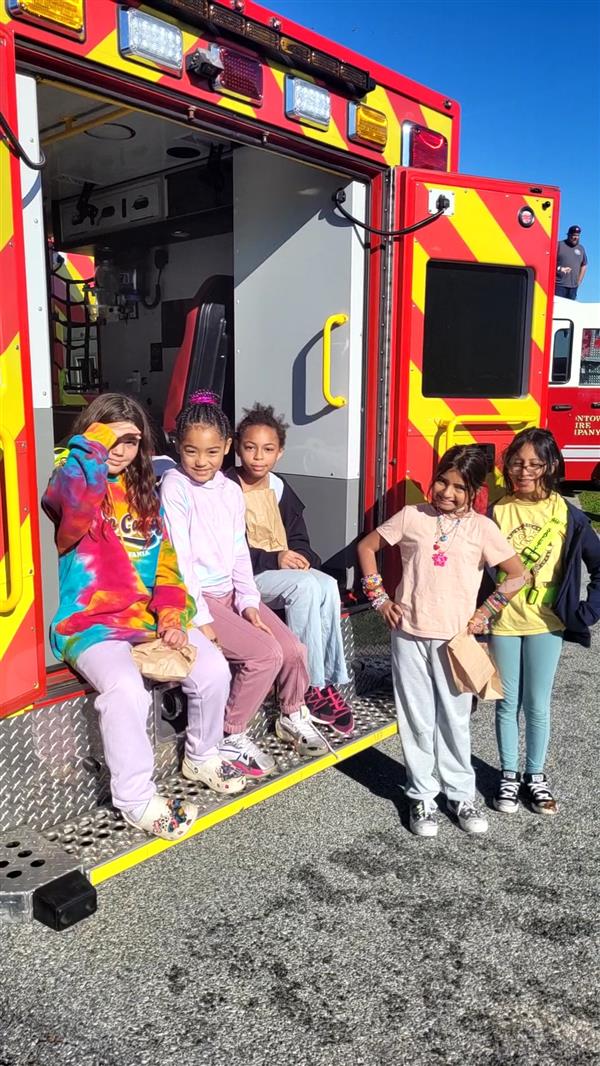 A group of children posing for a photo