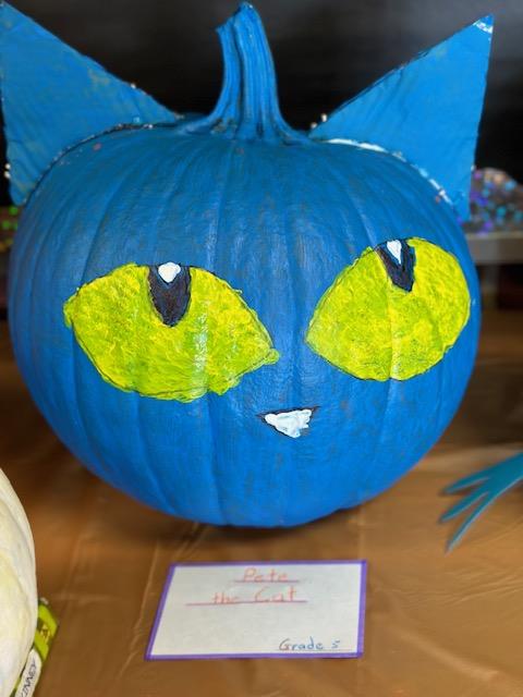 A photo of a painted pumpkin