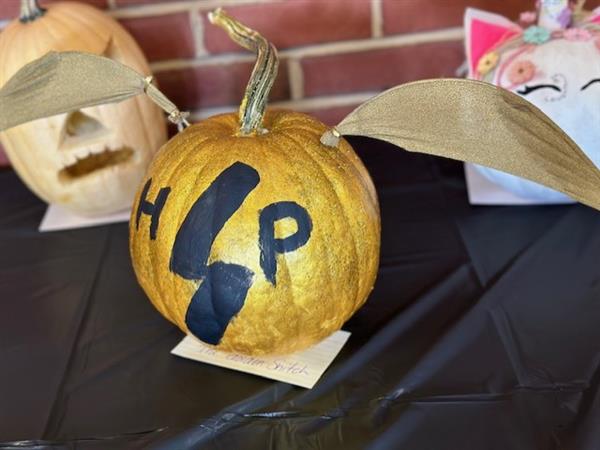 A photo of a painted pumpkin