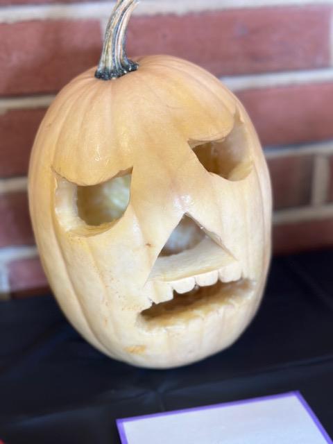 A photo of a painted pumpkin