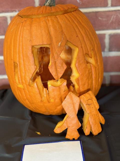 A photo of a painted pumpkin