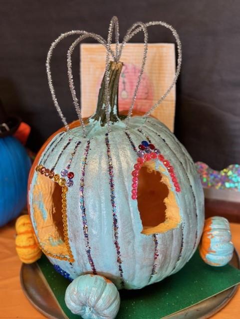 A photo of a painted pumpkin