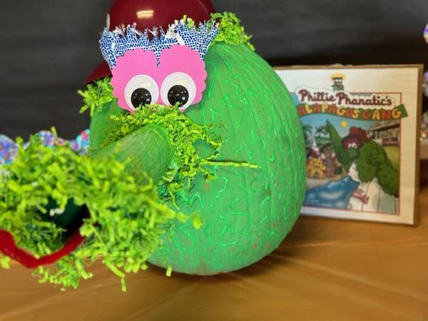 A photo of a painted pumpkin