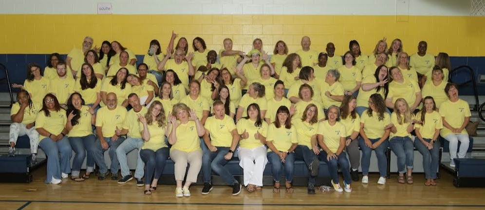 The 2026-2027 Carysbrook Elementary School staff take a silly photo together for the yearbook