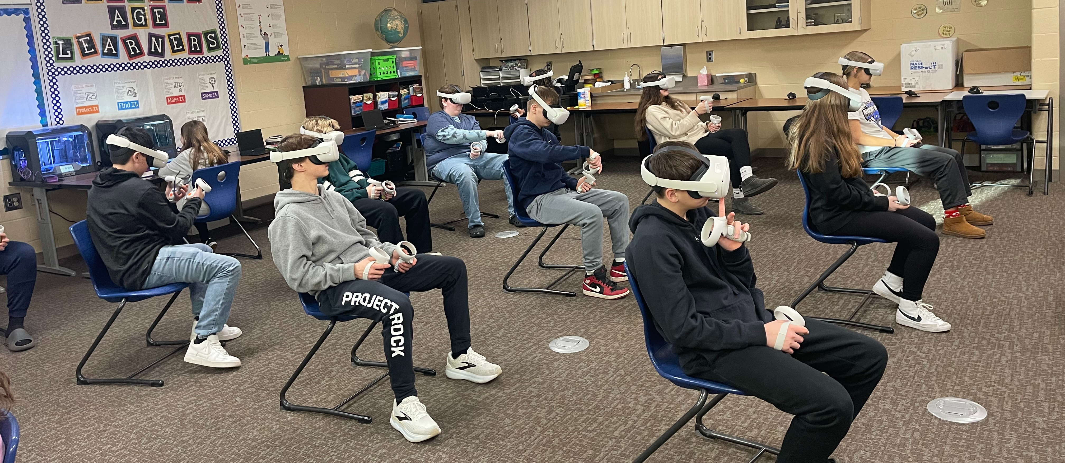 VR headsets being used by 8th graders