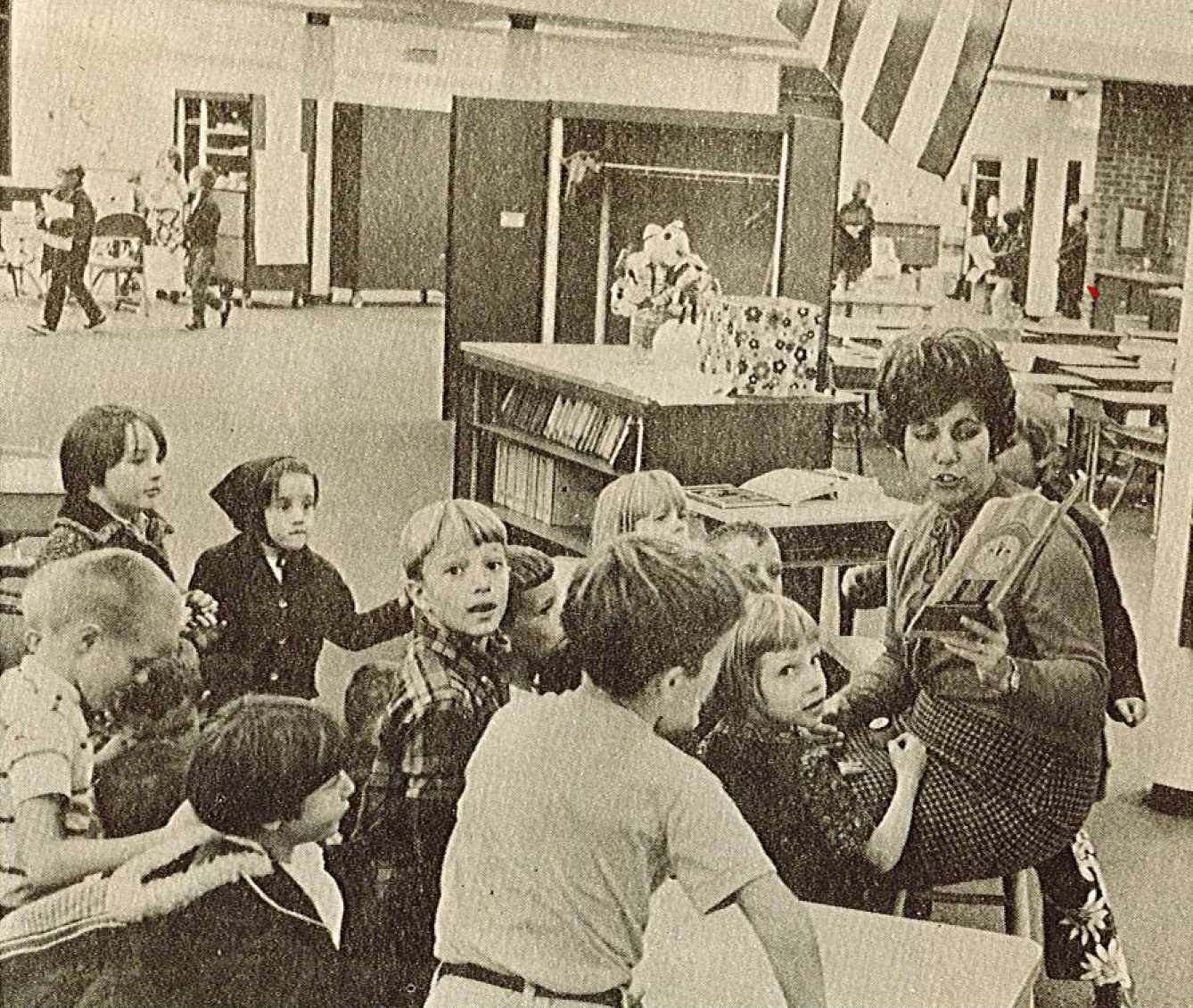 Newspaper Scan - Students are read a book