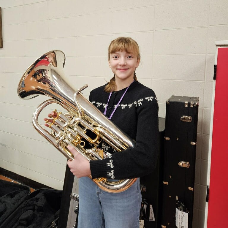 Junior High student with instrument