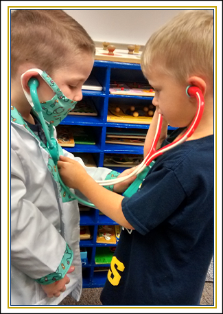 Two kids playing doctor game