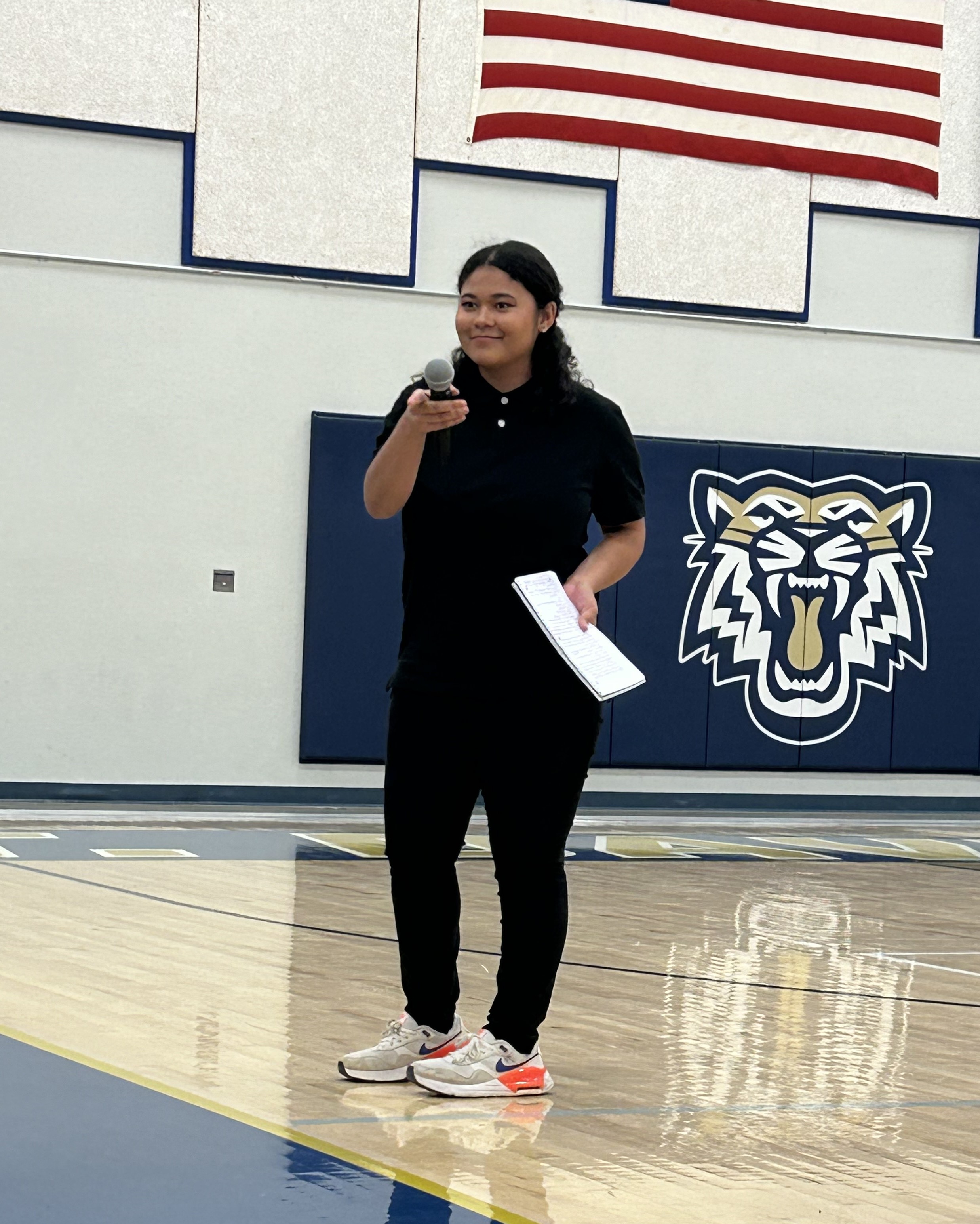 Student holding microphone