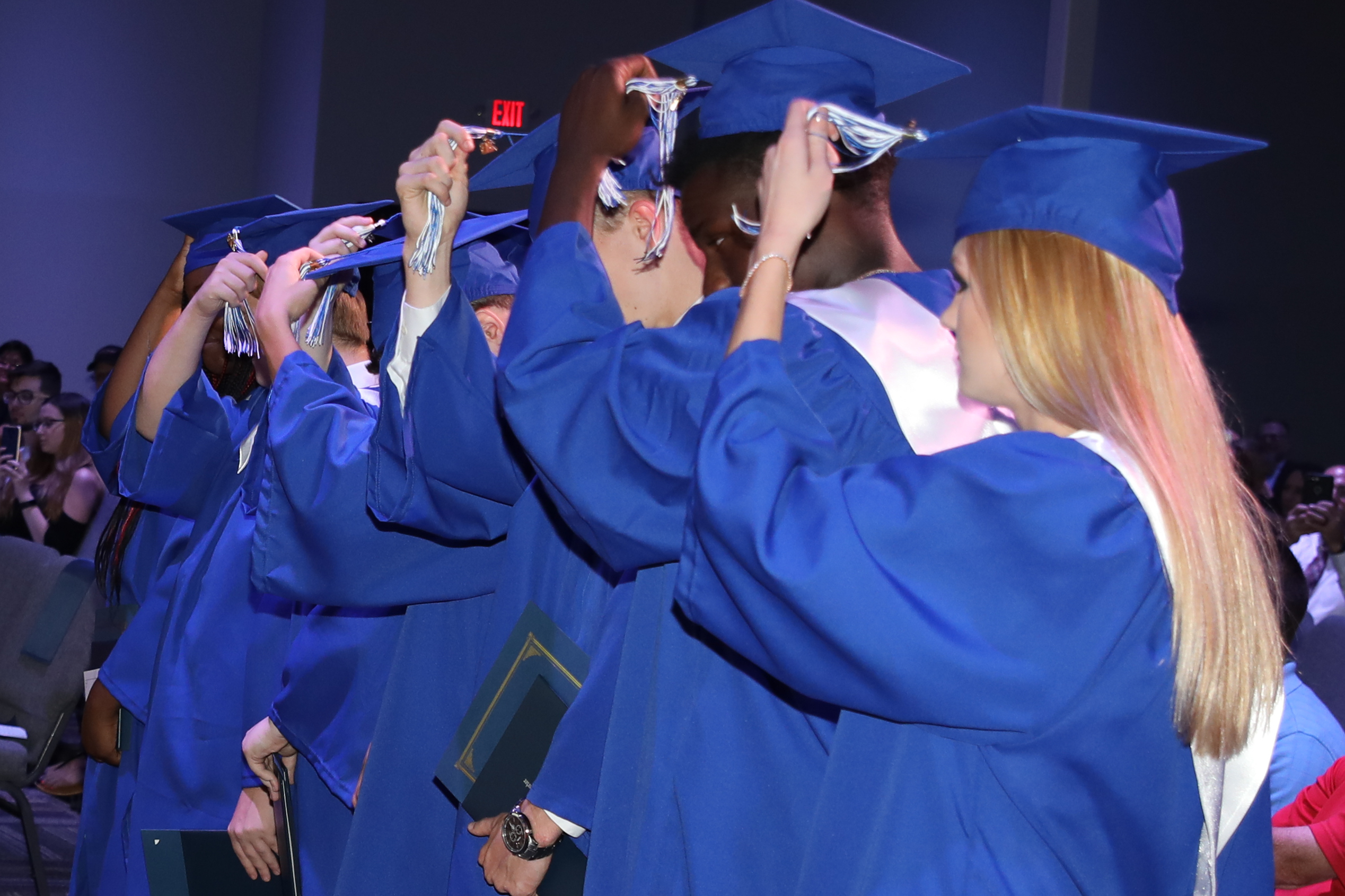 graduates in blue robes