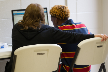 students learning with teacher